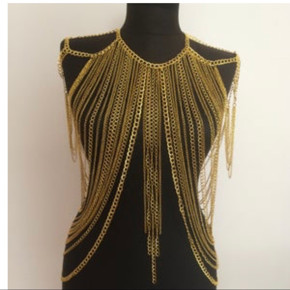 Body chain.... worn once, gold, heavy, imported. Carnival